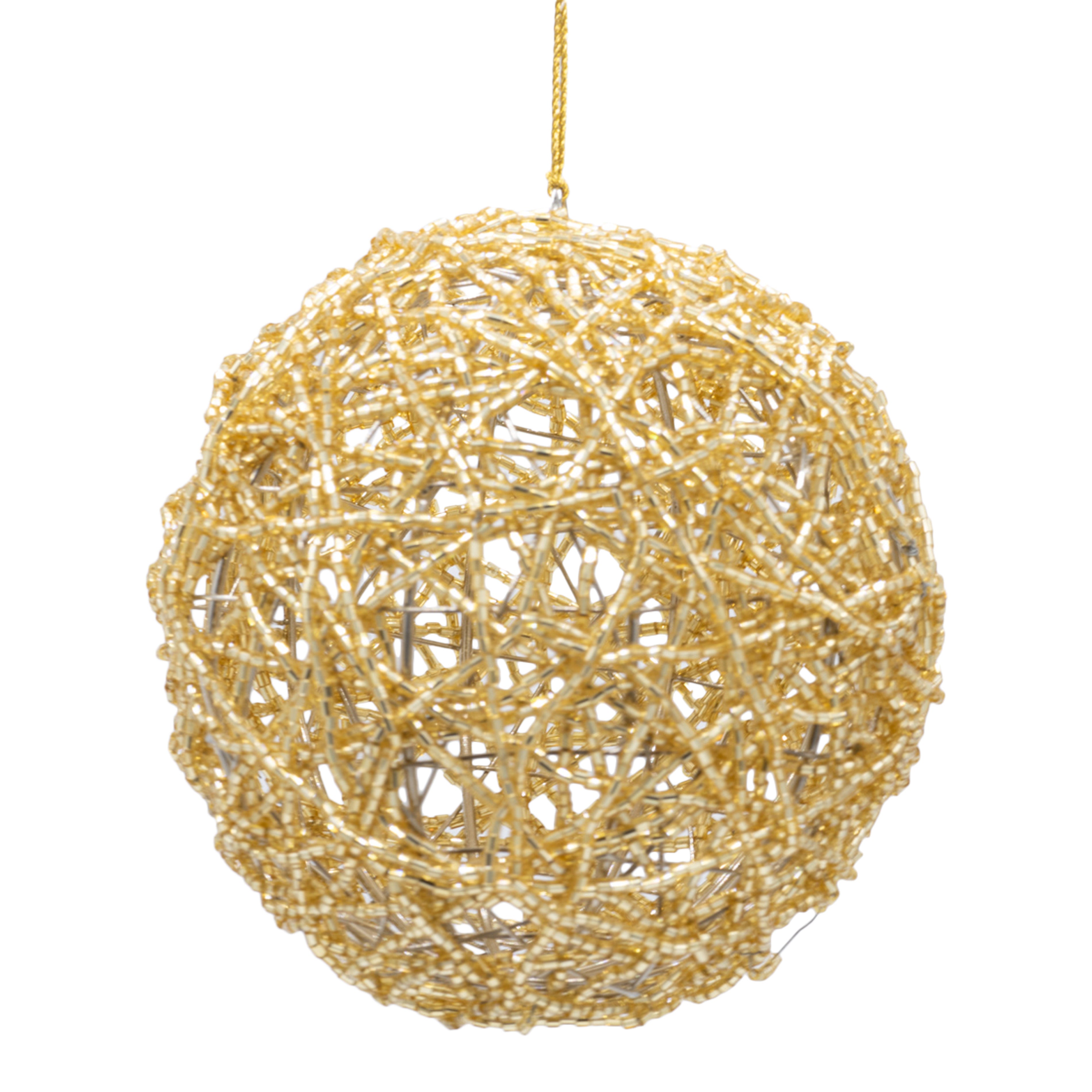 Gold beaded bauble on a white background